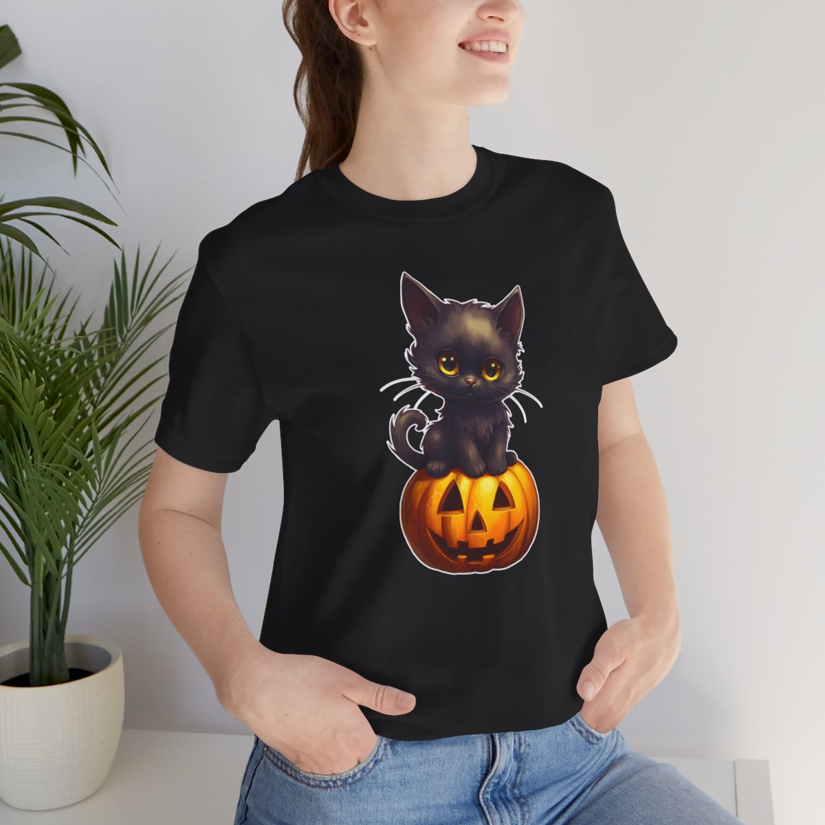 Black Kitten Cat Sitting on a Jack-o-lantern Halloween Pumpkin Unisex Jersey Short Sleeve Tee product thumbnail image