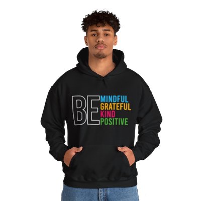 Encourage the world to be kind to each other in the comfy unisex Heavy Blend™ Hooded Sweatshirt