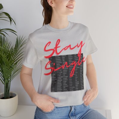 Stay Single shirt with anagram graphic filled with adjectives about the benefits of staying single